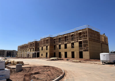 Multi-story Home2 Suites building under construction in Abilene, with exposed framing on upper floors.